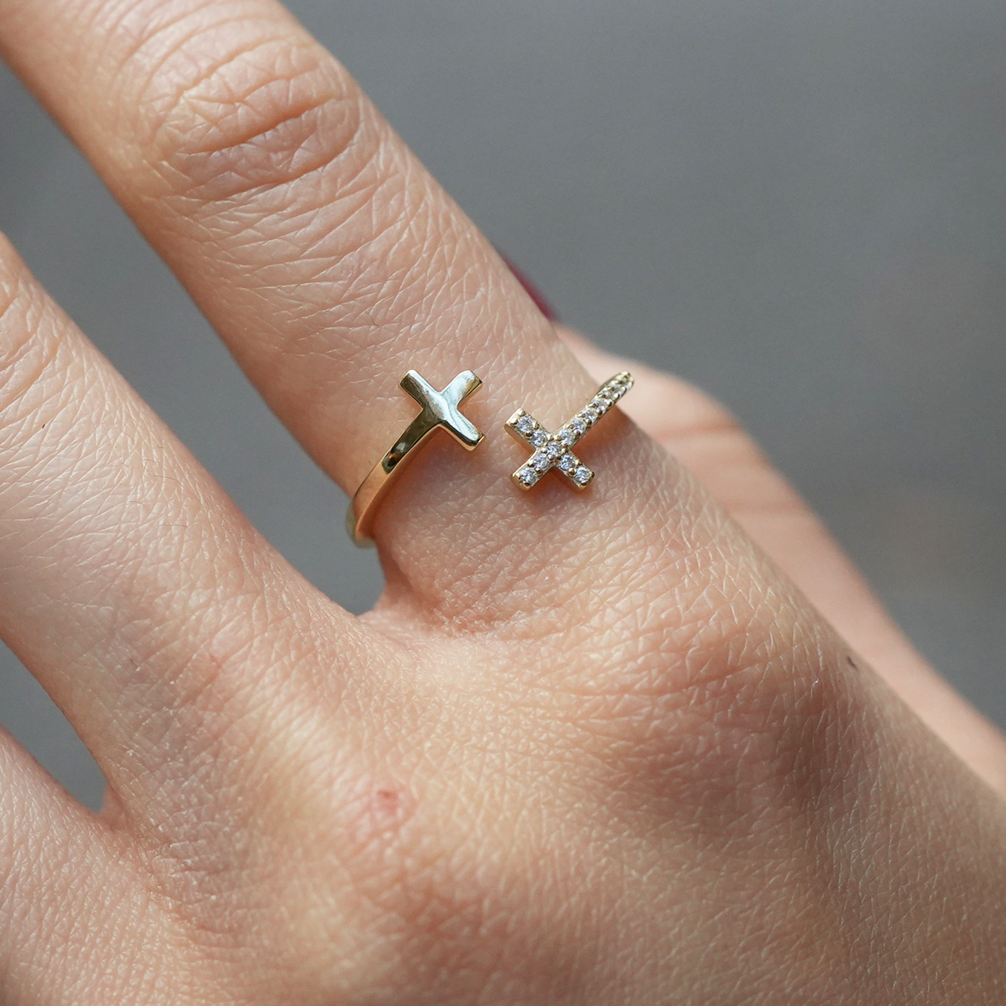 THE PAVÉ CROSS BYPASS RING