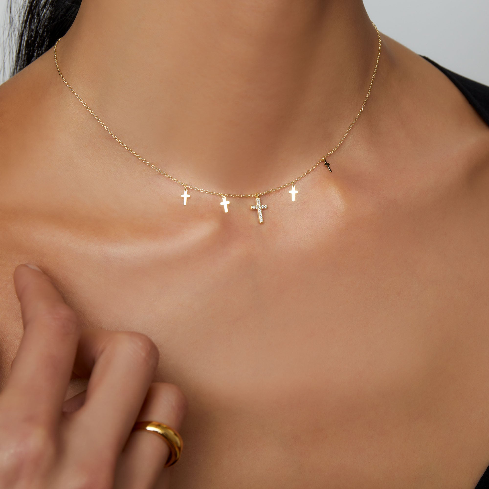 THE TINY MULTI CROSS NECKLACE