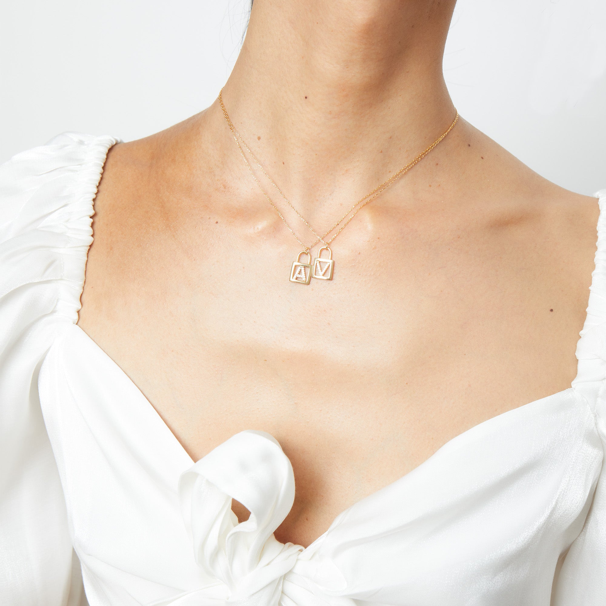 THE INITIAL LOCKET NECKLACE